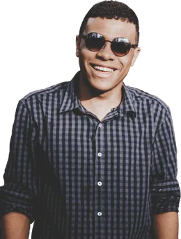 A young smiling man with sunglasses